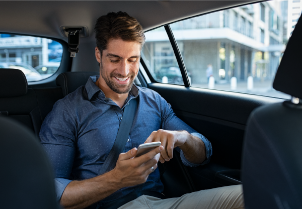 Man on phone inside car